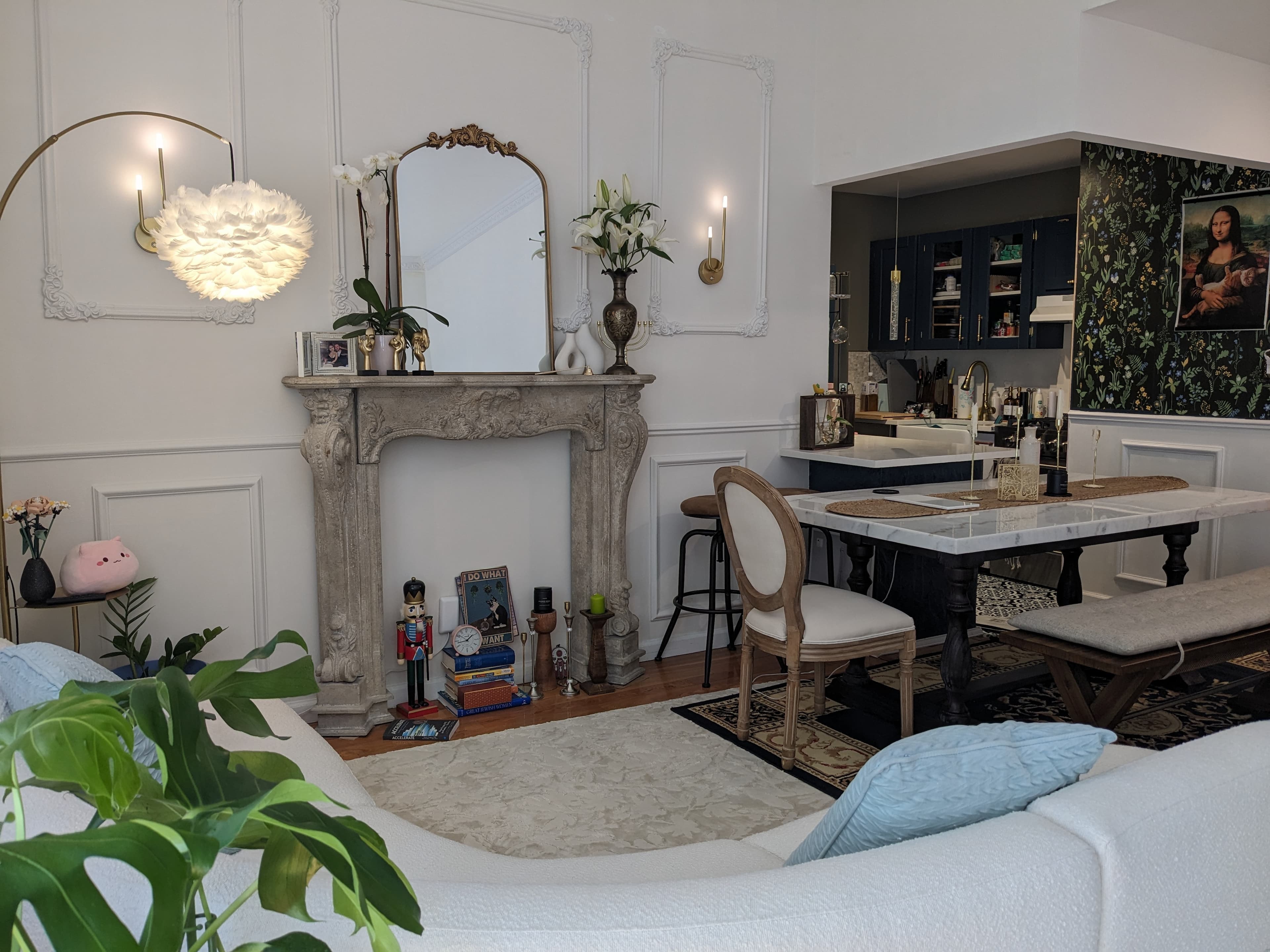 Then it arrived: wainscoting, sconces, marble, modern Parisian vibes.