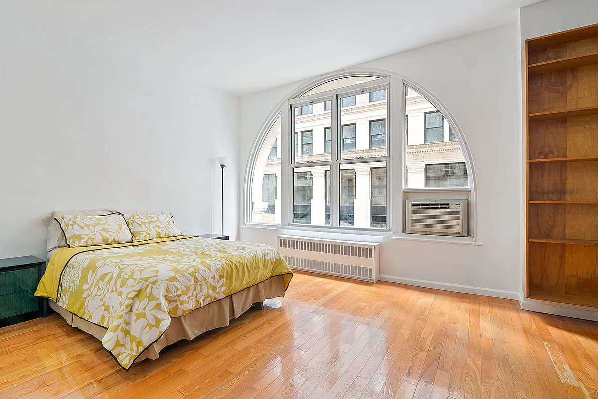 The arched window was love at first sight. Everything else had to go.